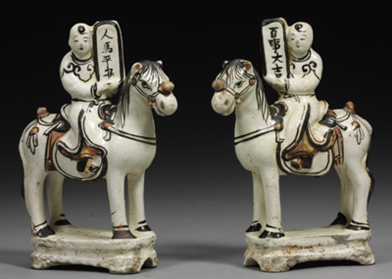 褐釉白瓷童子骑马像  明